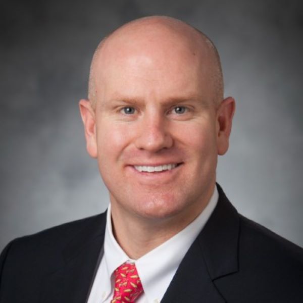 <br>Travis Dekker, M.D.