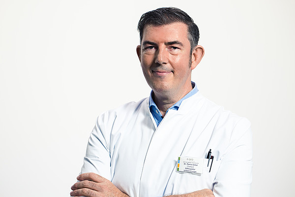 Dr. med.<br>Pierre Göbel