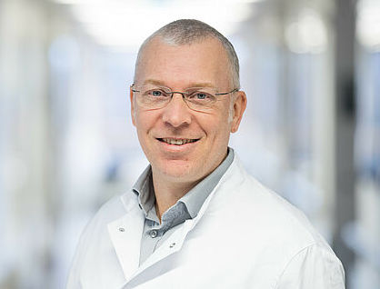 Dr. med.<br>Boris Hollinger